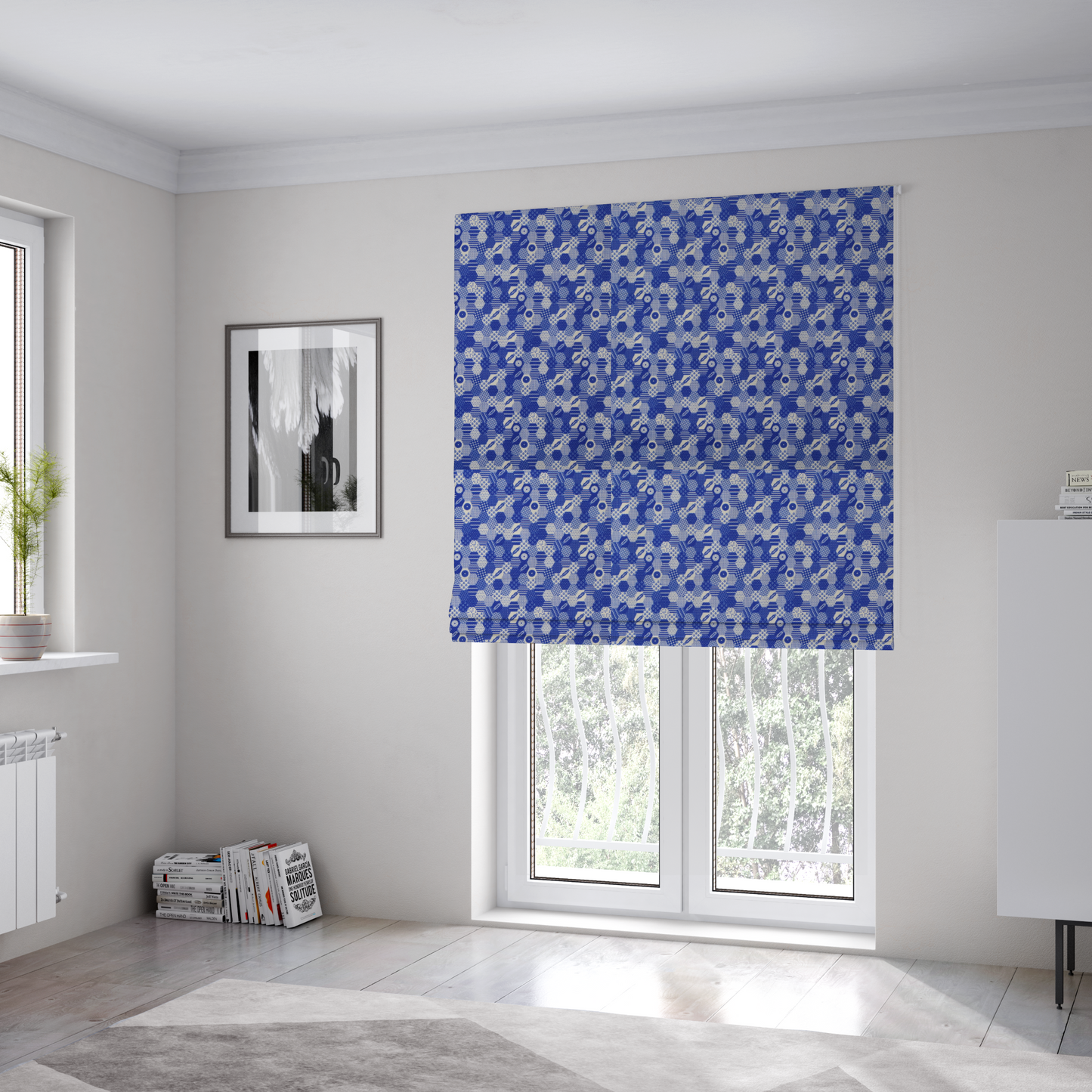 The fabric used to create these Roman blinds is a detailed geometric fabric featuring a dense honeycomb or hexagonal patchwork pattern in blue and white.