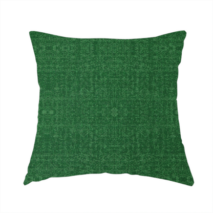 The fabric used to create this handmade cushion has a low contrast between the base colour and the print, the design reveals more detail upon closer inspection, offering a rich and understated elegance in different green tones.