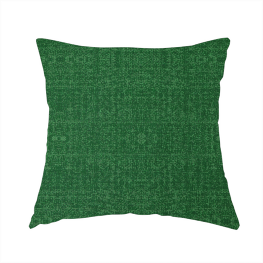 The fabric used to create this handmade cushion has a low contrast between the base colour and the print, the design reveals more detail upon closer inspection, offering a rich and understated elegance in different green tones.