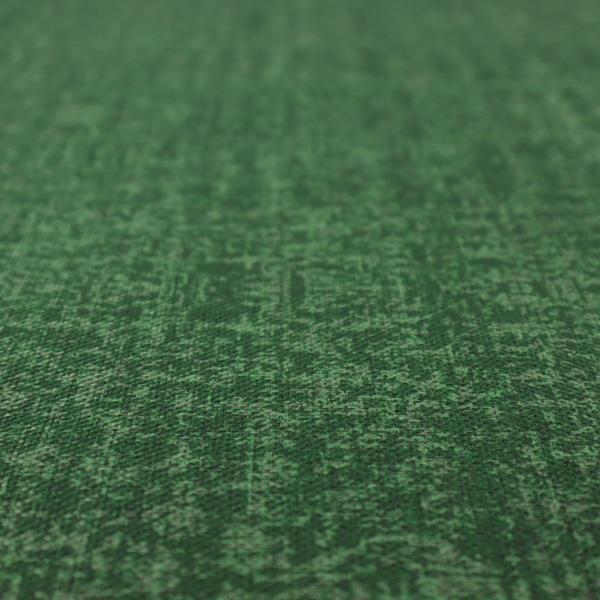 This fabric has a low contrast between the base colour and the print, the design reveals more detail upon closer inspection, offering a rich and understated elegance in different green tones.