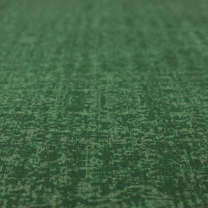 This fabric has a low contrast between the base colour and the print, the design reveals more detail upon closer inspection, offering a rich and understated elegance in different green tones.