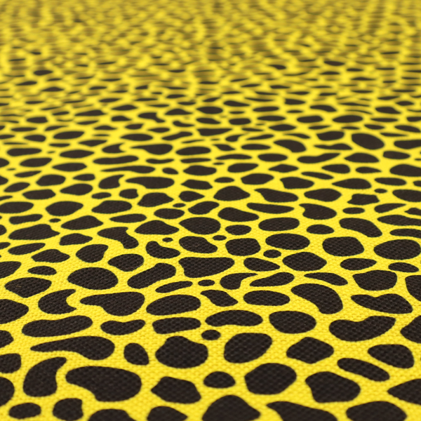 A bold cheetah-style animal print featuring irregular, black organic spots scattered across a bright canary yellow background.