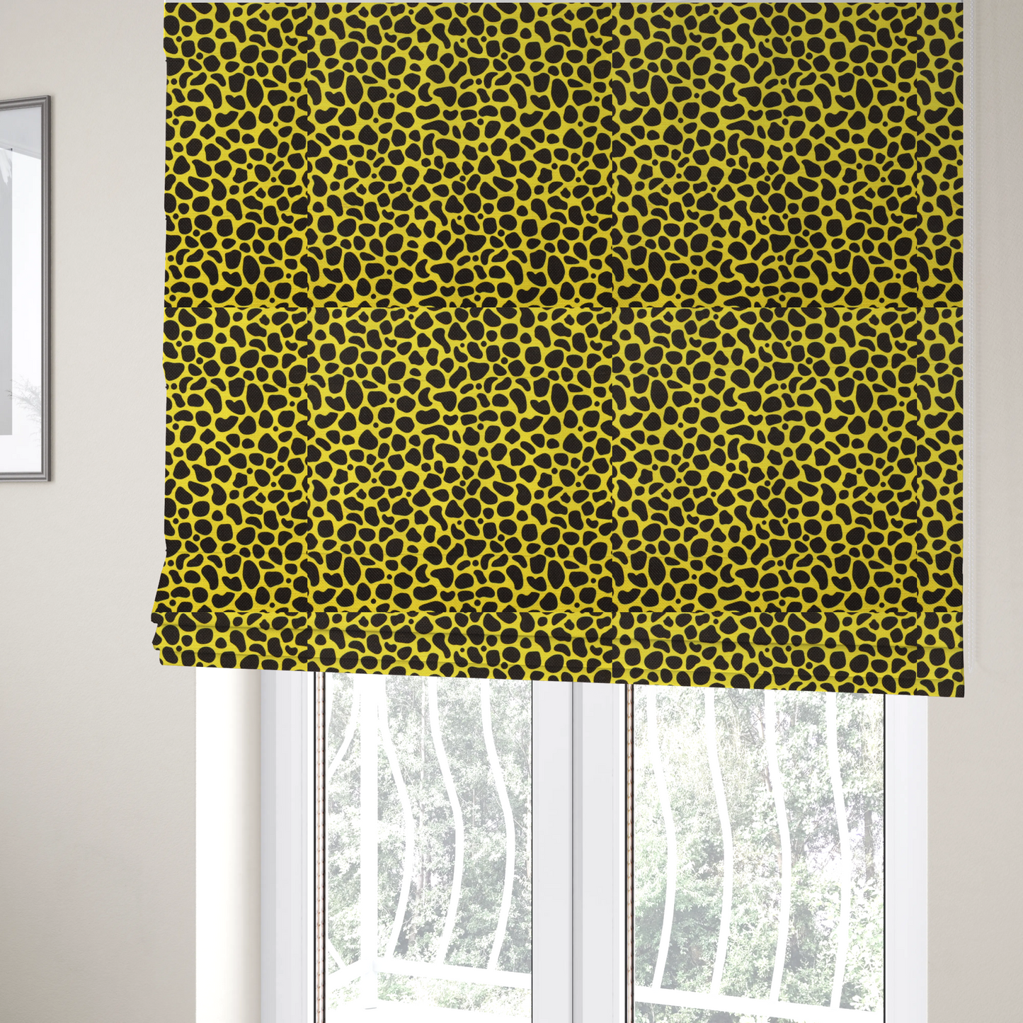 The fabric used to create these Roman blinds is a bold cheetah-style animal print featuring irregular, black organic spots scattered across a bright canary yellow background.
