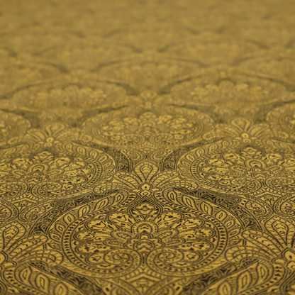 An intricate textile pattern featuring elaborate paisley-style medallions in black line work over an antique gold background. The design is highly detailed with swirling filigree, floral elements, and a repeating teardrop composition that creates a classic, traditional aesthetic.