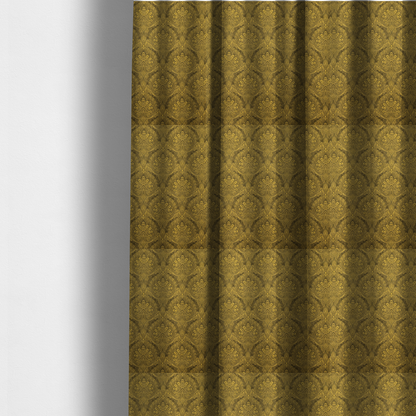 The fabric used to create these made-to-measure curtains is an intricate textile pattern featuring elaborate paisley-style medallions in black line work over an antique gold background. The design is highly detailed with swirling filigree, floral elements, and a repeating teardrop composition that creates a classic, traditional aesthetic.