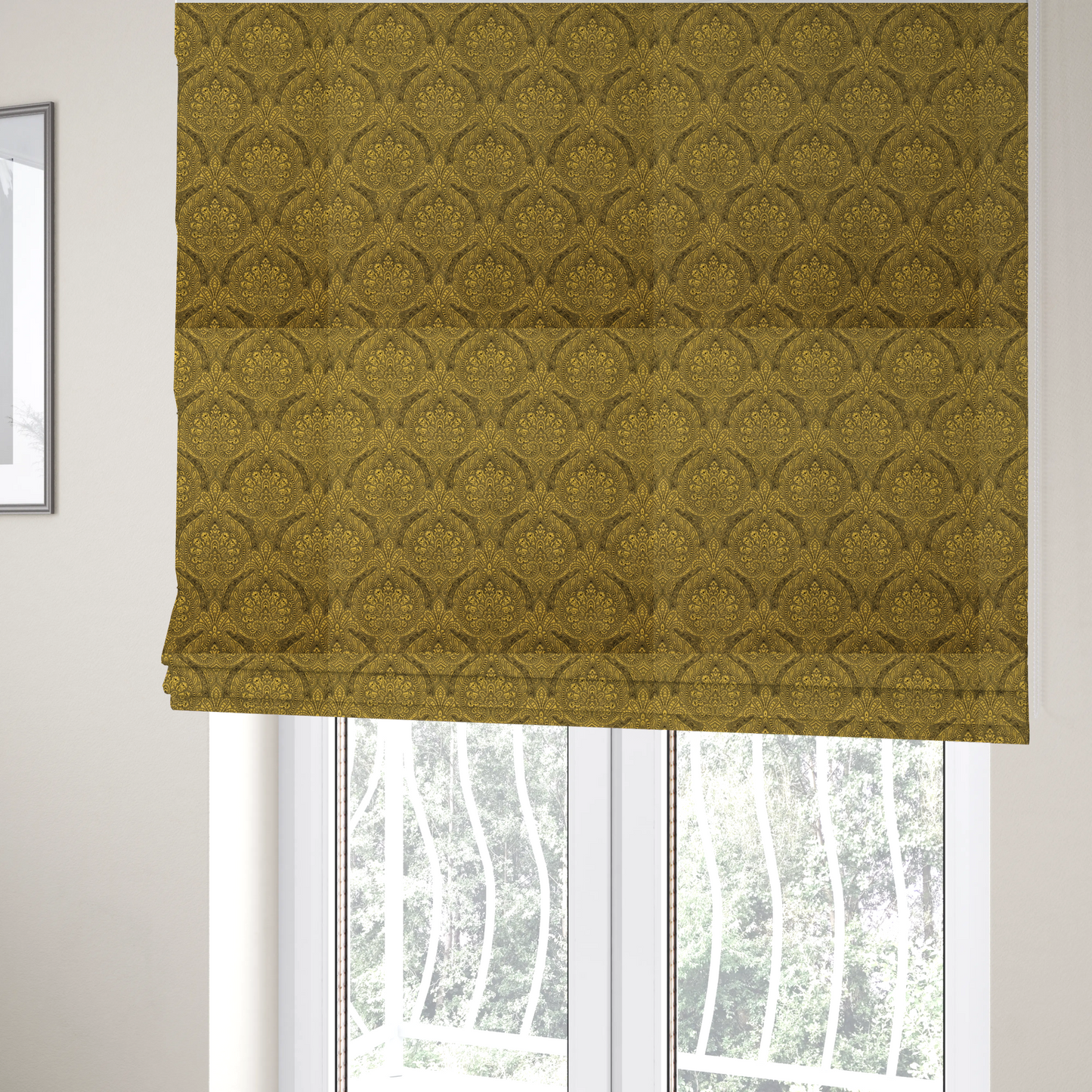 The fabric used to create these Roman blinds is an intricate textile pattern featuring elaborate paisley-style medallions in black line work over an antique gold background. The design is highly detailed with swirling filigree, floral elements, and a repeating teardrop composition that creates a classic, traditional aesthetic.