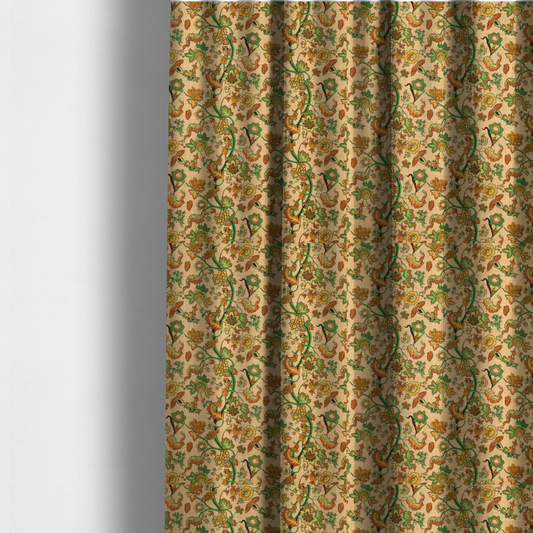 The fabric used to create these made-to-measure curtains is a vintage-style fabric featuring winding green vines and various floral blossoms in shades of orange, gold, and yellow. The pattern is set against a light beige, canvas-textured background, with a bohemian or arts-and-crafts aesthetic.