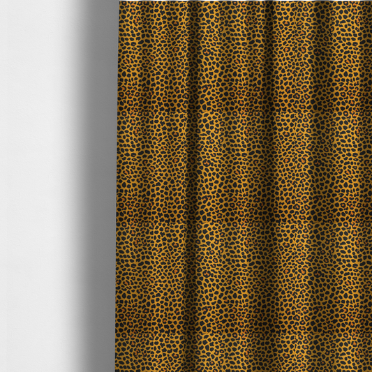 The fabric used to create these made-to-measure curtains is a high-contrast animal print fabric featuring a dense leopard-inspired pattern. The design consists of irregular black spots and open rosettes with warm orange-brown centres, set against a vibrant mustard-yellow background. The print is small-scale and tightly packed, with a visible fine-grained textile texture