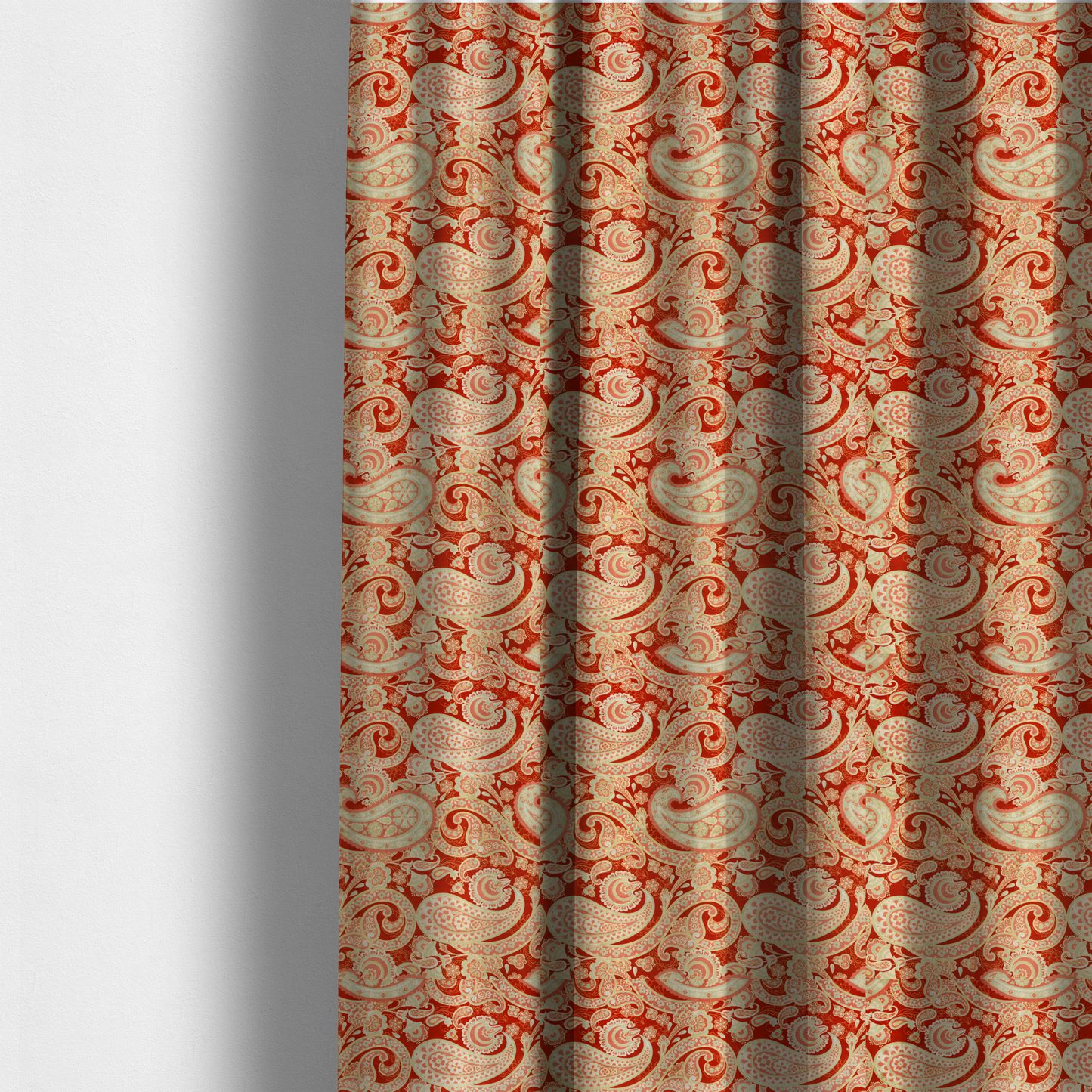 The fabric used to create these made-to-measure curtains is a vibrant, warm-toned textile featuring large-scale paisley teardrop motifs in shades of cream, pale mint, and soft orange against a bold red background. The intricate patterns within the paisley shapes include delicate floral borders and internal mandalas, surrounded by smaller scattered flower accents for a rich, traditional Indian-inspired aesthetic.