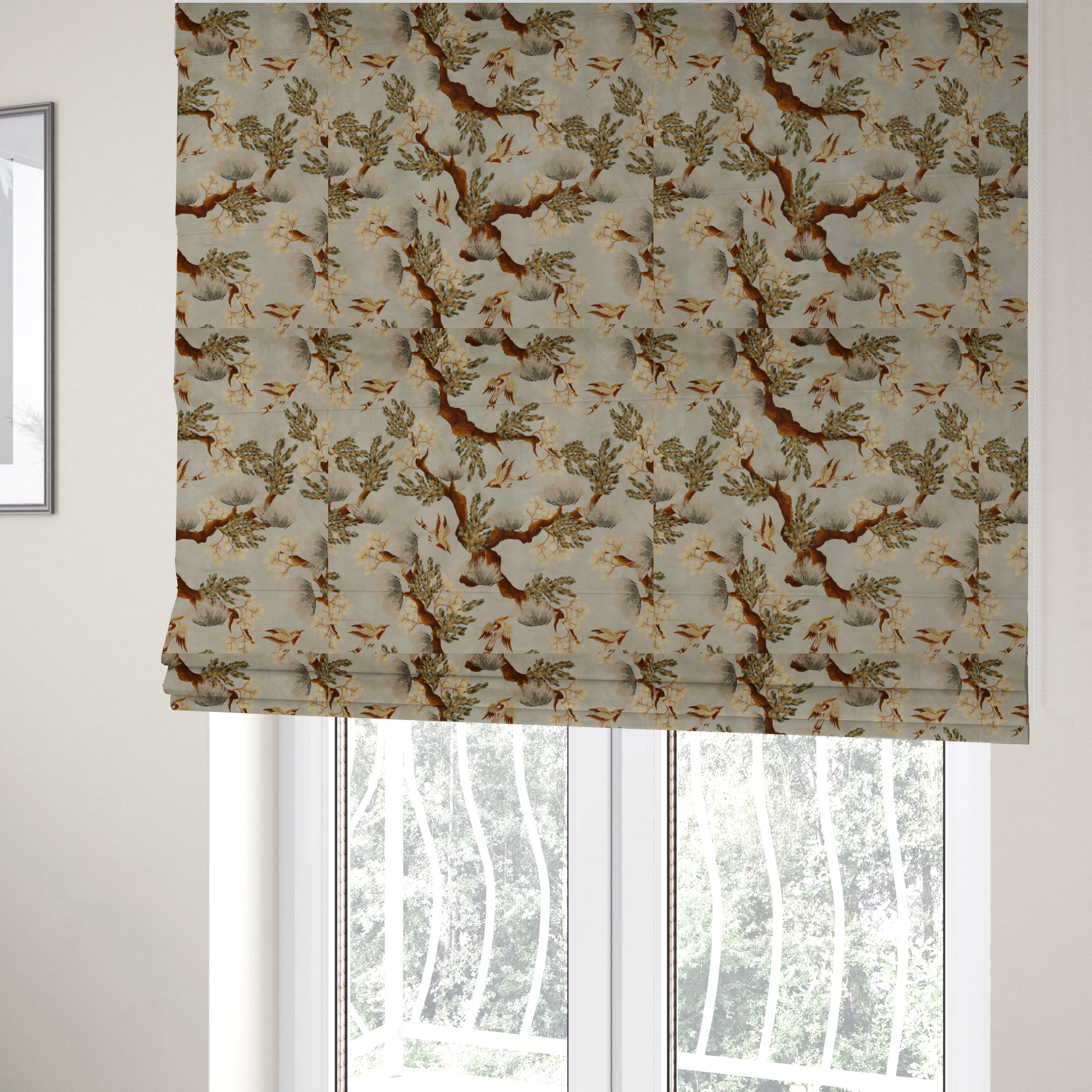 The fabric used to create these Roman blinds is a sophisticated textile featuring a Chinoiserie-style pattern with stylized birds in flight among winding, dark brown tree branches. The branches are adorned with clusters of pale cream blossoms and soft, pine-like needles. The entire design is set against a muted beige background creating a serene and classical aesthetic.