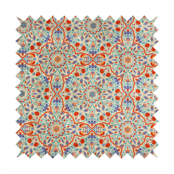 A decorative fabric with an Ottoman-style floral print. The design consists of repeating cobalt blue and turquoise tulips and deep red carnations intertwined with long, curving green leaves. The pattern mimics 16th-century Mediterranean ceramic tile art.
