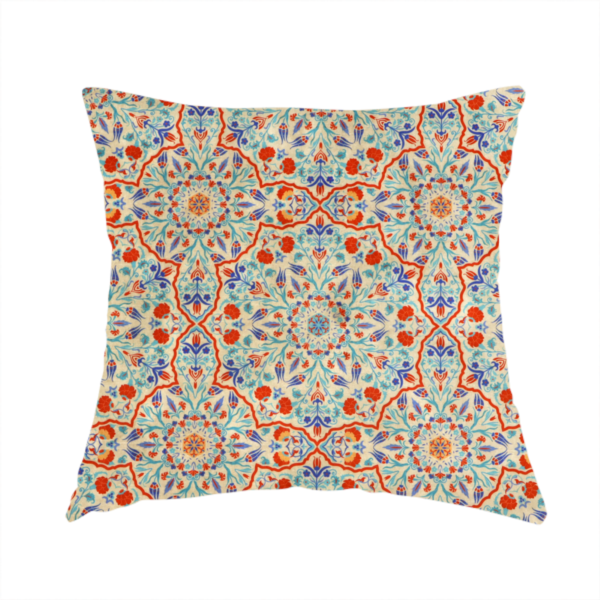The fabric used to create this handmade cushion is a decorative fabric with an Ottoman-style floral print. The design consists of repeating cobalt blue and turquoise tulips and deep red carnations intertwined with long, curving green leaves. The pattern mimics 16th-century Mediterranean ceramic tile art.