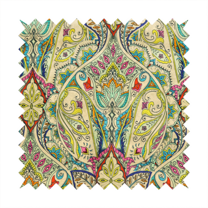 Vibrant bohemian paisley fabric with an intricate damask-style pattern featuring teal, yellow, pink, and orange motifs accented by bold black outlines on a warm cream background