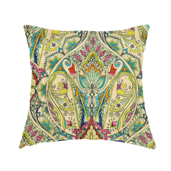The fabric used to create this handmade cushions is a vibrant bohemian paisley fabric with an intricate damask-style pattern featuring teal, yellow, pink, and orange motifs accented by bold black outlines on a warm cream background