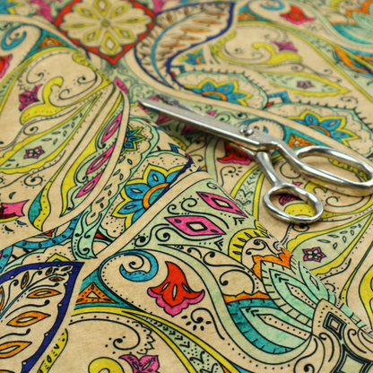 Vibrant bohemian paisley fabric with an intricate damask-style pattern featuring teal, yellow, pink, and orange motifs accented by bold black outlines on a warm cream background.