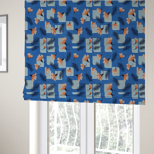 The fabric used to create these Roman blinds is a modern tropical fabric featuring a vibrant cobalt blue background with scattered orange fan-shaped flowers, dark navy palm fronds, and pale blue geometric square overlays.
