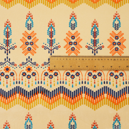 Folk-art style fabric featuring horizontal rows of stylized orange and navy floral pillars and geometric chevron borders on a warm cream background