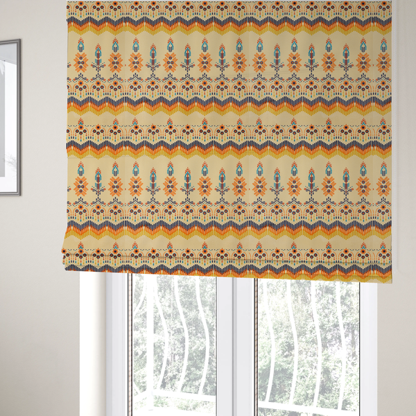 The fabric used to create these Roman blinds is a folk-art style fabric featuring horizontal rows of stylized orange and navy floral pillars and geometric chevron borders on a warm cream background