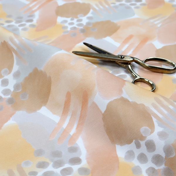 A dreamy, minimalist textile print featuring overlapping translucent washes of pastel colours. Soft blush and buttercup yellow shapes are layered with dusty blue blocks, delicate stippled dot patterns, and thin diagonal lines, creating a rhythmic yet airy impressionist design.