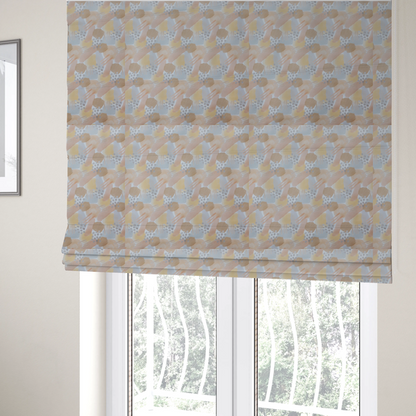 The fabric used to create these Roman blinds is a dreamy, minimalist textile print featuring overlapping translucent washes of pastel colours. Soft blush and buttercup yellow shapes are layered with dusty blue blocks, delicate stippled dot patterns, and thin diagonal lines, creating a rhythmic yet airy impressionist design.