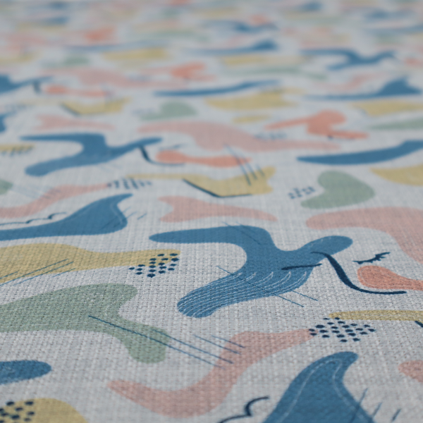 Abstract mid-century modern fabric featuring fluid organic shapes in dusty blue, blush pink, and mustard yellow with fine black line accents and stippled dot clusters on a light grey linen-textured background.