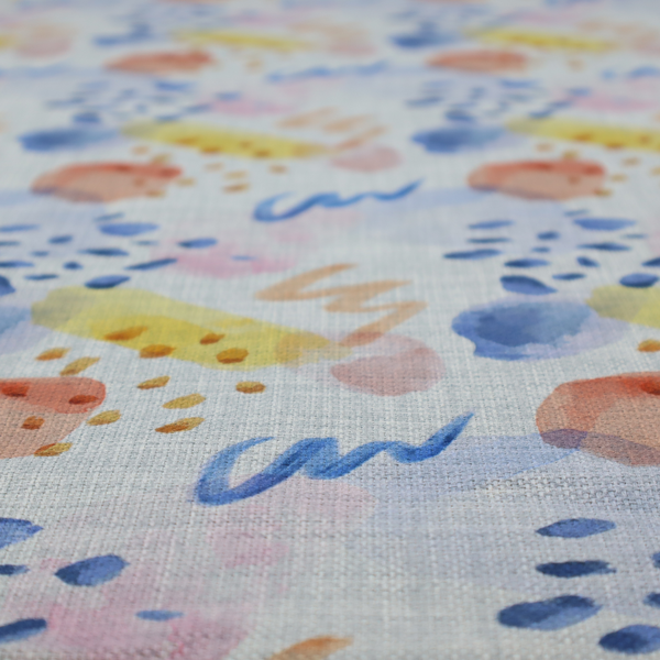 Abstract watercolour pattern of blue, ochre, and peach shapes with squiggly lines and navy dots on a light grey linen-textured background.