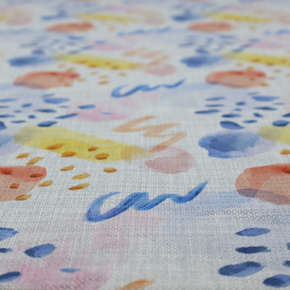 Abstract watercolour pattern of blue, ochre, and peach shapes with squiggly lines and navy dots on a light grey linen-textured background.