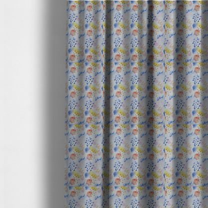 The fabric used to create these made-to-measure curtains is an abstract watercolour pattern of blue, ochre, and peach shapes with squiggly lines and navy dots on a light grey linen-textured background.
