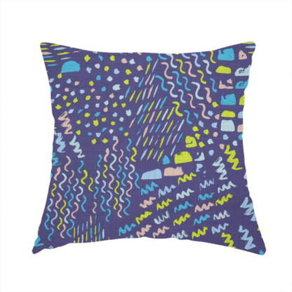 The fabric used to create this handmade cushion is a dense abstract pattern featuring a variety of hand-drawn squiggles, dots, and dashes in bright, contrasting tones scattered across a deep, dark-coloured textured fabric.