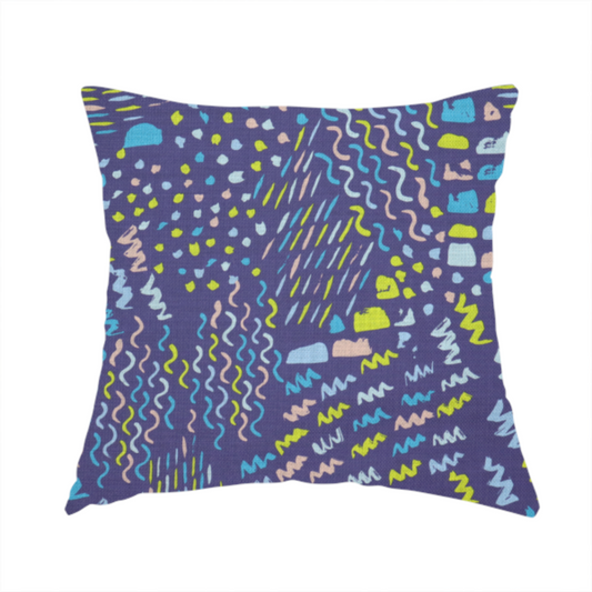 The fabric used to create this handmade cushion is a dense abstract pattern featuring a variety of hand-drawn squiggles, dots, and dashes in bright, contrasting tones scattered across a deep, dark-coloured textured fabric.