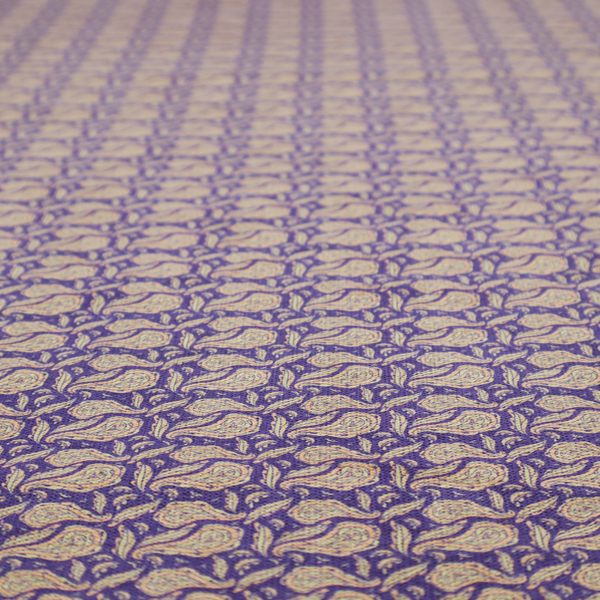 A dense, intricate upholstery fabric featuring a traditional paisley teardrop pattern with delicate ornamental linework repeating across a deep, dark-toned background.