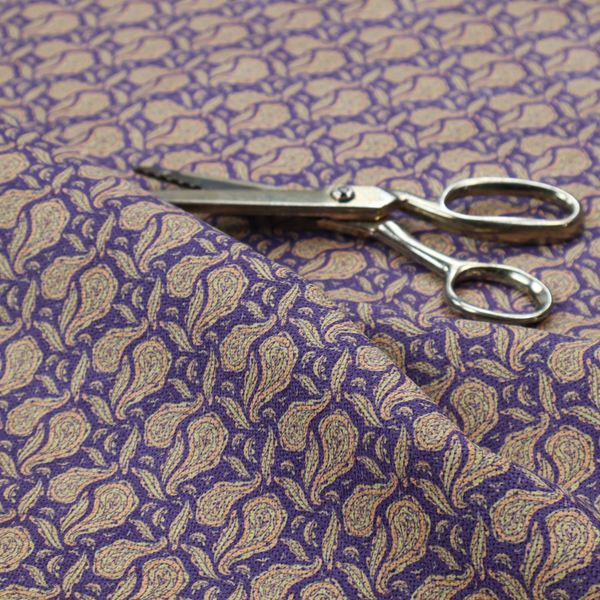 A dense, intricate upholstery fabric featuring a traditional paisley teardrop pattern with delicate ornamental linework repeating across a deep, dark-toned background.