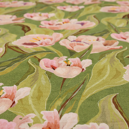 A lush, large-scale botanical pattern featuring soft-textured tulips and flowing green foliage in a romantic, painterly style across a solid green background.