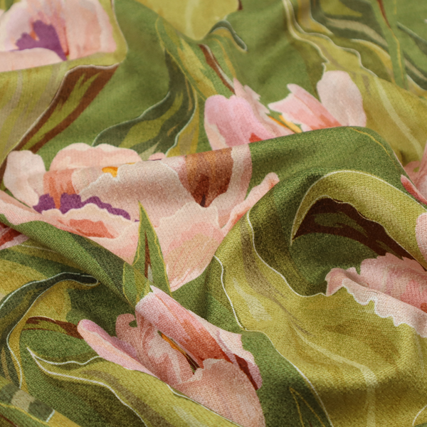 A lush, large-scale botanical pattern featuring soft-textured tulips and flowing green foliage in a romantic, painterly style across a solid green background.