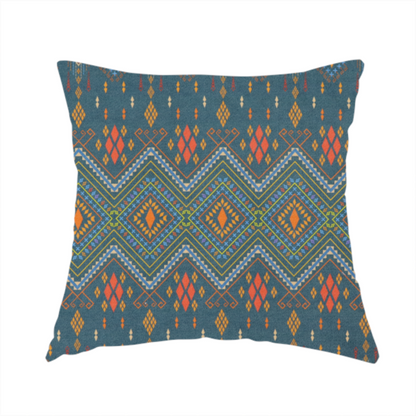 The fabric used to create this handmade cushion is an intricate geometric fabric featuring a central band of vibrant diamond motifs and tiered horizontal borders of tribal-style symbols and linework on a solid, deep-toned background.