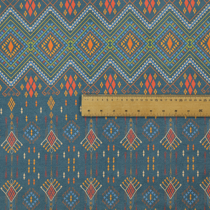 An intricate geometric fabric featuring a central band of vibrant diamond motifs and tiered horizontal borders of tribal-style symbols and linework on a solid, deep-toned background.