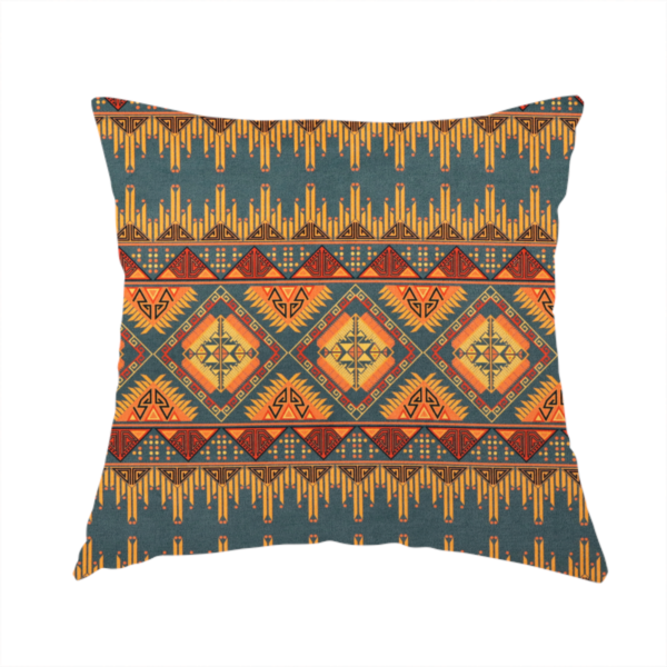The fabric used to create this handmade cushion is a detailed geometric fabric featuring tiered horizontal bands of intricate diamond motifs, zig-zag patterns, and sharp tribal-style linework in warm, sun-drenched tones.