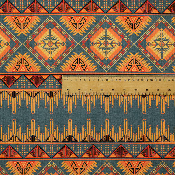 A detailed geometric fabric featuring tiered horizontal bands of intricate diamond motifs, zig-zag patterns, and sharp tribal-style linework in warm, sun-drenched tones.