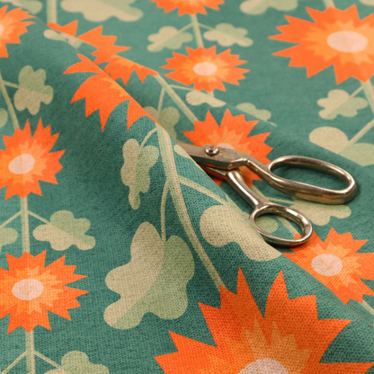This fabric features a retro-inspired geometric floral pattern with a distinct mid-century modern aesthetic. The design is structured in vertical columns against a textured, deep teal-green background.