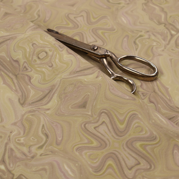 This fabric features an elegant marbled kaleidoscope pattern with a symmetrical, mirrored layout that creates a sophisticated and rhythmic visual texture.