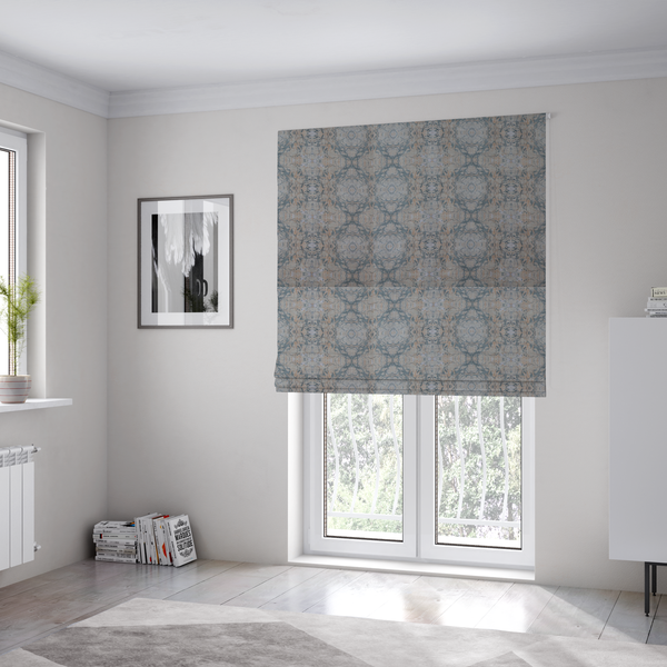 The fabric used to create these Roman blinds is a woven fabric featuring a symmetrical, repeating abstract pattern with a marble-like swirl effect in muted tones of dusty blue, sandy tan, and soft grey.
