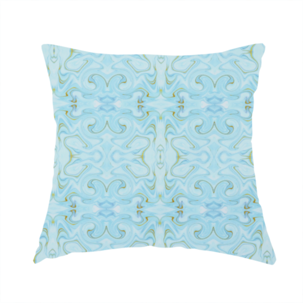 The fabric used to create this handmade cushion is a repeating, symmetrical pattern of fluid, marble-like swirls in shades of sky blue, white, and subtle golden-yellow on a light blue background.