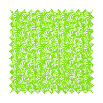 A vibrant, lime-green fabric featuring a dense, repeating pattern of elegant, white, swirling botanical motifs