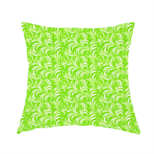 The fabric used to create this handmade cushion is a vibrant, lime-green fabric featuring a dense, repeating pattern of elegant, white, swirling botanical motifs