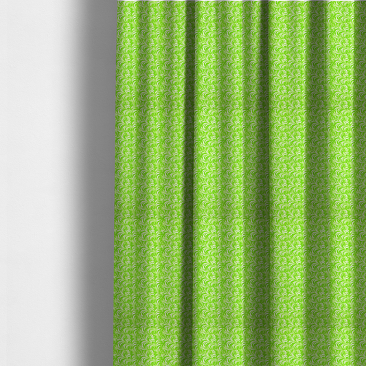 The fabric used to create these made-to-measure curtains is a vibrant, lime-green fabric featuring a dense, repeating pattern of elegant, white, swirling botanical motifs
