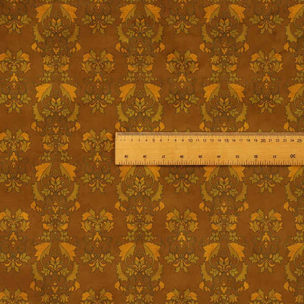 An ornate, vintage-style damask fabric featuring repeating, intricate botanical motifs in rich shades of burnt orange, gold, and deep brown with a subtly aged, textured appearance.