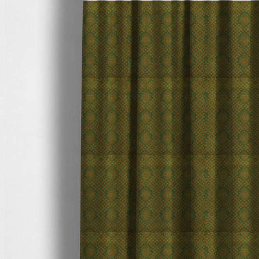 The fabric used to create these made-to-measure curtains is a repeating, decorative fabric pattern featuring ornate, gold-toned paisley motifs centred on a deep forest green background. The design is structured around a subtle lattice of small, delicate floral sprigs, creating a traditional, block-printed aesthetic with a slightly weathered, vintage texture.