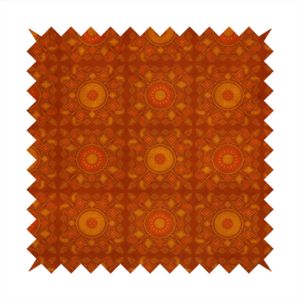 A warm, ornate repeating pattern with a rich, vintage aesthetic. It draws heavy inspiration from traditional South Asian and Middle Eastern textile designs, specifically echoing elements of Mandala art and Paisley motifs.