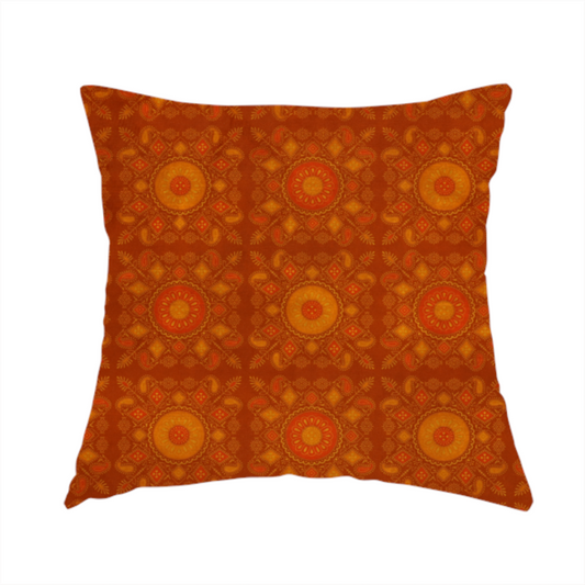 The fabric used to create these handmade cushions is a warm, ornate repeating pattern with a rich, vintage aesthetic. It draws heavy inspiration from traditional South Asian and Middle Eastern textile designs, specifically echoing elements of Mandala art and Paisley motifs.