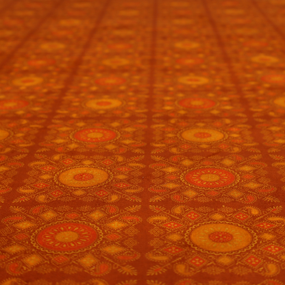 A warm, ornate repeating pattern with a rich, vintage aesthetic. It draws heavy inspiration from traditional South Asian and Middle Eastern textile designs, specifically echoing elements of Mandala art and Paisley motifs.